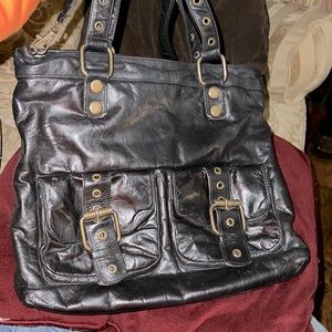 Kooba black leather pocket book.